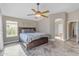 Comfortable bedroom with natural light and plenty of space for relaxation at 10305 E Plata Ave, Mesa, AZ 85212