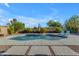 Sparkling pool with lounge chairs and desert landscaping offers a tranquil outdoor oasis at 10305 E Plata Ave, Mesa, AZ 85212