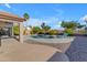 Inviting pool is surrounded by desert landscaping and lounge chairs, perfect for outdoor relaxation at 10305 E Plata Ave, Mesa, AZ 85212