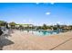 Large, inviting community pool with plenty of seating for relaxation and enjoyment at 10344 E Trillium Ave, Mesa, AZ 85212