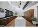 Modern kitchen featuring an island, sleek cabinets, and stainless steel appliances at 10344 E Trillium Ave, Mesa, AZ 85212