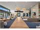 Spacious lounge area offering stylish seating, ambient lighting, and a welcoming atmosphere at 10344 E Trillium Ave, Mesa, AZ 85212