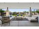 Comfortable outdoor lounge featuring sofas, chairs, and access to community amenities at 10344 E Trillium Ave, Mesa, AZ 85212