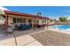 Serene backyard with a covered patio offers ample space for outdoor enjoyment and entertaining at 1062 E Watson Dr, Tempe, AZ 85283