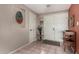 Bright foyer with double doors, neutral walls, tile flooring, and decorative accents at 1062 E Watson Dr, Tempe, AZ 85283