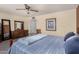 Comfortable main bedroom provides a relaxing retreat with great natural light and ample closet space at 1062 E Watson Dr, Tempe, AZ 85283