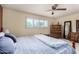 Comfortable main bedroom offers a relaxing retreat with serene decor and ample natural light at 1062 E Watson Dr, Tempe, AZ 85283