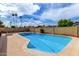 A beautiful, private pool in a spacious backyard setting is perfect for cooling off and relaxing at 1062 E Watson Dr, Tempe, AZ 85283