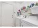 Bright laundry room featuring a washer and dryer for convenient home chores at 10755 W Mountain View Dr, Avondale, AZ 85323