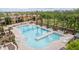 Expansive community pool with ample lounge seating and lush landscaping, perfect for relaxation and recreation at 1162 S Agnes Ln, Gilbert, AZ 85296