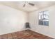 Bedroom with tiled floor and ceiling fan at 126 E Mclellan Rd, Mesa, AZ 85201