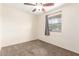 Bright bedroom features carpet and a window at 126 E Mclellan Rd, Mesa, AZ 85201