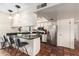 A charming kitchen with granite countertops, stainless appliances, and an inviting breakfast bar with bar stool seating at 126 E Mclellan Rd, Mesa, AZ 85201