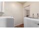Laundry room with white appliances at 126 E Mclellan Rd, Mesa, AZ 85201
