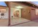 Covered outdoor patio featuring concrete floor and outdoor lighting at 126 E Mclellan Rd, Mesa, AZ 85201
