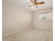 Bedroom featuring a ceiling fan and shuttered windows at 1332 E Redfield Rd, Tempe, AZ 85283
