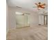 Spacious bedroom features a ceiling fan and large mirrored closet at 1332 E Redfield Rd, Tempe, AZ 85283