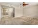 Bedroom features a ceiling fan, closet, and ensuite bath at 1332 E Redfield Rd, Tempe, AZ 85283