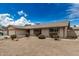 A cozy home with desert landscaping, showcasing its neutral color palette and well-maintained exterior at 1332 E Redfield Rd, Tempe, AZ 85283