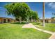 Well maintained green space surrounded by homes and mature landscaping at 13424 N Emberwood Dr, Sun City, AZ 85351
