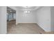 Dining room showcasing tile floors and modern lighting fixtures at 13424 N Emberwood Dr, Sun City, AZ 85351