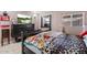 Comfortable bedroom with a dresser and a TV at 13608 N 33Rd Ave, Phoenix, AZ 85029