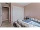 Comfortable bedroom with a closet and a view of the doorway at 13608 N 33Rd Ave, Phoenix, AZ 85029