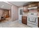 Cozy kitchen with white appliances and tiled flooring at 13608 N 33Rd Ave, Phoenix, AZ 85029