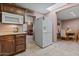 Bright kitchen with tiled floors, skylight, and modern appliances at 13608 N 33Rd Ave, Phoenix, AZ 85029