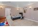 Open living area with tiled flooring and neutral decor at 13608 N 33Rd Ave, Phoenix, AZ 85029
