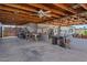 Spacious covered patio with seating, a desk, and overhead beams at 13608 N 33Rd Ave, Phoenix, AZ 85029