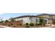 Side view of a home, nicely landscaped with a brick wall and desert landscaping at 14587 W Alexandria Way, Surprise, AZ 85379
