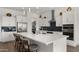 Bright kitchen with an island, stainless steel appliances, and walk-in pantry at 14587 W Alexandria Way, Surprise, AZ 85379