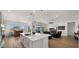 Open floor plan integrates a kitchen island and living space, ideal for entertaining and Gathering time at 14587 W Alexandria Way, Surprise, AZ 85379