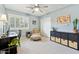 Comfortable bedroom with a sitting area, natural light, and functional storage, creating a versatile space at 14655 S 25Th Way, Phoenix, AZ 85048