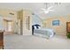 Large bedroom featuring vaulted ceilings, plush carpeting, and ample natural light at 14655 S 25Th Way, Phoenix, AZ 85048