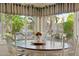 Charming breakfast nook featuring a wood table with views of the landscaped backyard at 14655 S 25Th Way, Phoenix, AZ 85048