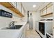 Functional laundry room featuring ample counter space and modern appliances at 14655 S 25Th Way, Phoenix, AZ 85048