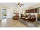 Cozy living room with tile floors, ceiling fan, and comfortable seating arrangement at 14655 S 25Th Way, Phoenix, AZ 85048
