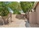 Private side yard with gravel landscaping, perfect for additional outdoor space and activities at 14655 S 25Th Way, Phoenix, AZ 85048