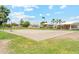 Enjoy a friendly game on the community's outdoor sand volleyball court surrounded by lush green landscaping at 14655 S 25Th Way, Phoenix, AZ 85048