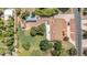 Aerial view of home featuring a large backyard, detached garage and long driveway at 154 E Redfield Rd, Chandler, AZ 85225