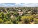 Extensive suburban lot aerial view showing a large lawn and mature trees providing a private, serene environment at 154 E Redfield Rd, Chandler, AZ 85225