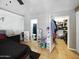 Spacious bedroom featuring a tile floor, ensuite bathroom, and walk in closet at 154 E Redfield Rd, Chandler, AZ 85225