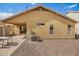 Spacious backyard with a covered patio, and low-maintenance landscaping for outdoor enjoyment at 16661 W Belleview St, Goodyear, AZ 85338