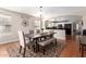 Dining room with tile floors and a sliding glass door at 16661 W Belleview St, Goodyear, AZ 85338