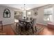Dining room with tile floors and a sliding glass door at 16661 W Belleview St, Goodyear, AZ 85338
