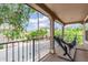 A charming balcony with wrought iron railing and peaceful neighborhood view at 1689 E Elgin St, Gilbert, AZ 85295