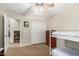 Neutral bedroom featuring a ceiling fan, bunk beds and closet with bi-fold doors at 1689 E Elgin St, Gilbert, AZ 85295