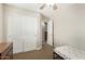 Comfortable bedroom featuring closet, window, and neutral colors at 1689 E Elgin St, Gilbert, AZ 85295